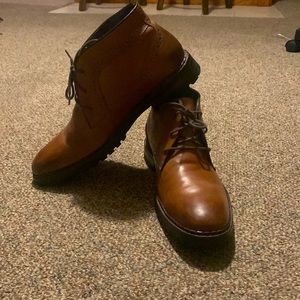 Brown mens dress shoes by Johnston and Murphy.